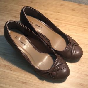 Brown wedge pumps